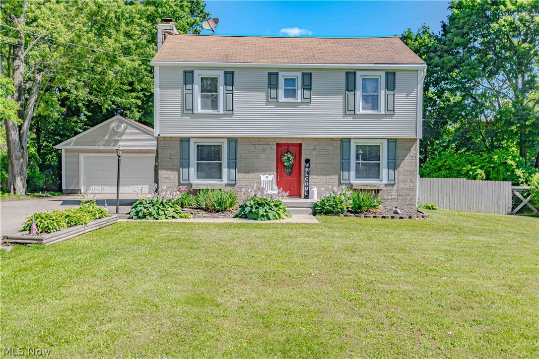 Welcome home to this charming property in Coventry Township, situated on over a half-acre of fully fenced yard space, offering plenty of room to enjoy the outdoors. The expansive driveway and oversized garage provide abundant parking for vehicles, recreational equipment, and guests. An additional bonus room located behind the garage offers incredible flexibility and was previously used as a home gym. Currently utilized for storage, this versatile space could easily serve as a home office, hobby room, workshop, studio, or whatever best fits your lifestyle. Inside, you'll appreciate the convenience of first-floor laundry and a functional layout designed for everyday living. The kitchen comes complete with all stainless steel appliances, making your move even easier. Step outside to the huge deck overlooking the backyard, the perfect setting for entertaining, summer barbecues, or simply relaxing while enjoying your private outdoor space. With its generous lot, flexible living areas, and exceptional parking and storage options, this home offers a wonderful combination of comfort, convenience, and versatility.