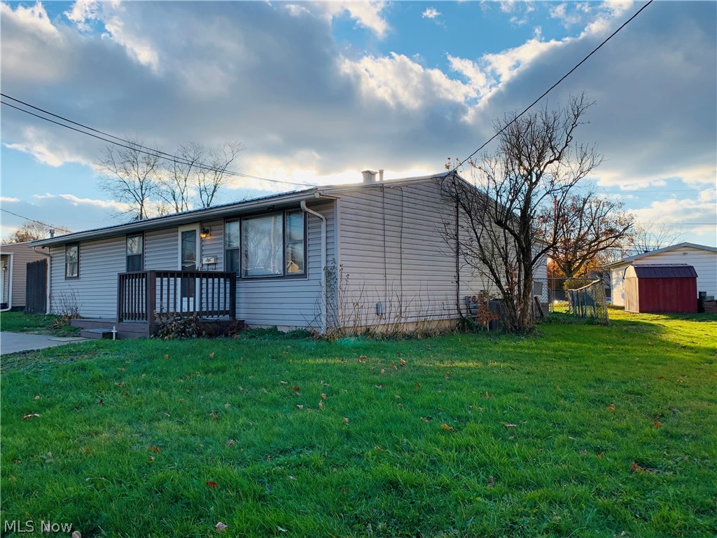 Open today 12/23 from 12:00 noon to 1:15 pm & again on 12/30 4:00 to 5:30. Just reduced. Lots of good times packed into this little but mighty ranch home!!  The kitchen is a really attractive feature and includes Stove & Refrigerator.  Currently has been used as a 2BR .......because  owner converted tandem third BR into a LARGE closet plus storage room.  First Floor Laundry includes Washer/Dryer. Furthermore, you may step from the Kitchen into the 4-season room. Multi-purpose room or just go and slip away to hide there or enjoy the Sunset. Also, outside you have a deck for Barbequing in your fenced back yard.  Yes the storage shed can stay. Now, for those of you who have a true appreciation of a "real" two-car Garage, here you go.   Yes it has Water / Drain / Electric / Door Opener and extra outside concrete parking.  Check the photo. It looks good!  Enters from the "back street". A 24-Hour Video-Security System remains.