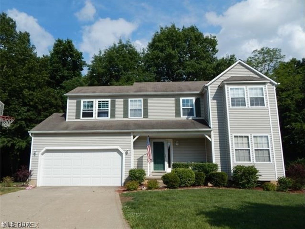 Ready Immediately! Spacious Open Floor plan Colonial-style Home with Attached 2 Car Garage and Full Unfinished Basement on a Wooded Cul-De-Sac Lot located in the city of Medina, OH! The home has 1,678 sq. ft. of above ground living space with 3 Bedrooms, 2.5 Baths. Large Eat-in Kitchen, Oak Cabinets, Appliances (New Refrigerator coming soon) Laminate Flooring and Bay Window seating area in the Dinette. The Family Room has a Woodburning Fireplace with Wood Laminate Flooring. There is a private 14'X10' Wood Deck with views of trees and nature. New Carpet on stairs and upper level. Master Bedroom with Cathedral Ceiling and Storage/Display area above has a private Bath with dual sinks, garden tub & separate shower. 2 Other Bedrooms have great closet and storage space. Upper Level Laundry Room is also provided. Covered Front Porch, Vinyl Siding and Storage Shed/Outbuilding. All appliances stay. Newer insulated garage door in 2012 & some new energy efficient windows in 2013 added. Home Warra