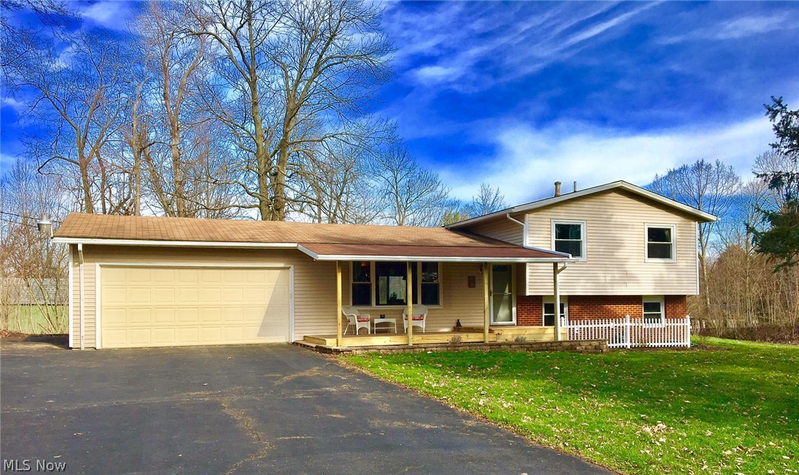 WOW!!! This gorgeous home located in Plain School District has been updated TO-THE-NINES and I don't even know where to begin!!! Right away you'll appreciate the AWESOME curb appeal and BRAND NEW 8X24 COVERED TWO-TIER DECK!!! Home is situated on a HUGE landscaped lot LOADED with perennials, and there's also a new outbuilding!!! Inside enjoy the warm and tasteful neutral decor and color scheme throughout!!! The "pride of ownership" REALLY shows here; MOVE-IN-READY!!! BRAND NEW CUSTOM BAMBOO ((HARDWOOD)) FLOORING was just professionally installed in the living & dining rooms, lower level family room, on BOTH sets of steps and in the upper level hallway - it's absolutely BEAUTIFUL!!! The entryway, kitchen, and bathroom ALL offer new ceramic tile floors, and the bedrooms all have newer carpeting!!! Interior doors and new High-Efficiently windows were just installed throughout with matching custom oak trim that accents the kitchen cabinets and flooring beautifully!!! The lower level family