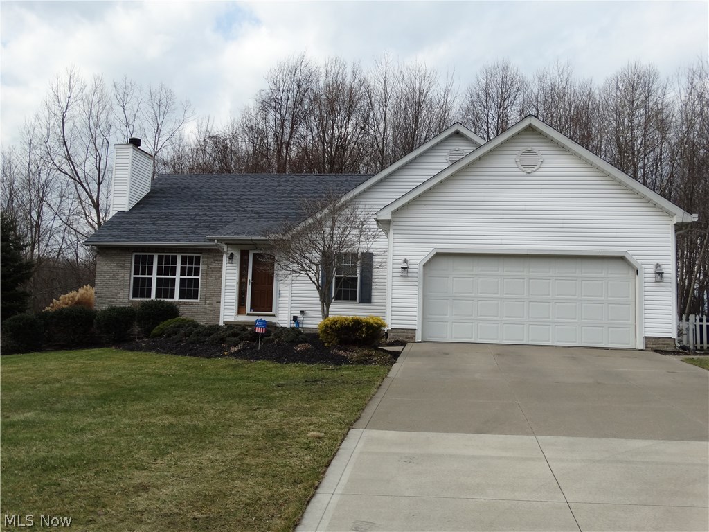 A rare find in Madison, this beautiful ranch is in move-in condition.  The living room has a vaulted ceiling, and is open to the dining room.  The dining room features a bay window for abundant natural light.  The eat-in kitchen features glass doors, opening onto a massive deck, perfect for relaxing or entertaining in the large, quiet backyard.  KraftMaid cabinets and Silestone countertops are the kitchen's other key features.  The Master bedroom has a Master bath with Jacuzzi tub for relieving the day's stress, and also has a separate shower.  There is a mud room off the attached two-car garage.