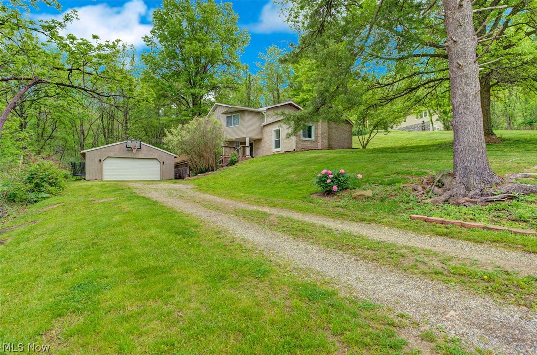 Welcome to this beautifully renovated 3-bedroom, 2-bath gem in Lake Mohawk! Nestled on a lovely private corner lot, this home shines with modern updates and serene views from every angle. Enjoy the convenience of a flat driveway and an oversized detached 2-car garage with a newer door and a solid roof.
Step inside to discover fresh paint, new flooring throughout, tall windows that fill the home with natural light, and a spacious living area with soaring ceilings. The kitchen boasts new recessed lighting and opens to an additional flex space—perfect for a dining room or cozy breakfast nook. Two bedrooms feature walk-in closets, plus there’s a fourth room ideal for an office or guest space.
Major improvements include: leveled floors and porch with added supports, new roof and gutters, newer windows, recently tied into natural gas, thus the updated furnace with SMART thermostat, plumbing flush, new retaining and rock walls, and replaced glass block. This home is truly move-in ready!
Located within the private, gated Lake Mohawk community, you'll love access to the 500-acre unlimited horsepower lake, three beaches, 9-hole executive golf course (with separate membership), clubhouse, and tennis/pickleball courts. Come enjoy lake life at its finest—updates, privacy, and community amenities all in one!