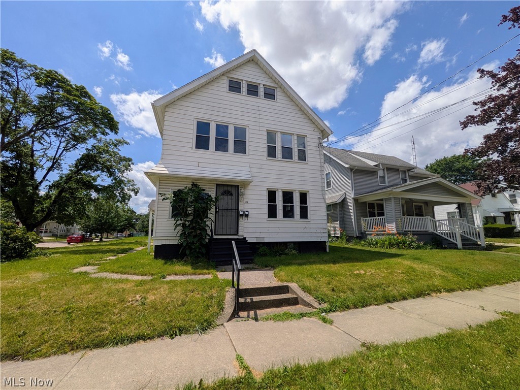 Turnkey, cash-flowing duplex in East Akron! This fully updated and rent-ready property is an excellent opportunity for both investors and owner-occupants looking to offset their mortgage with rental income.

The exterior features a newer dimensional shingle roof, low-maintenance vinyl and aluminum siding, and a detached 1.5-car garage. Inside, both units have been thoughtfully updated with vinyl replacement windows, new LVP flooring, fresh carpet in all bedrooms, updated bathrooms with new vanities and shower surrounds, and modern finishes throughout. The first-floor unit boasts a beautifully updated kitchen with new cabinets and countertops, plus an enclosed front porch for additional convenience.

Adding character rarely found in rental properties, the dining rooms feature custom built-in wood shelving with leaded glass cabinet doors. The second-floor unit includes an enclosed porch and offers even more living space with a finished third-floor bedroom and bonus tandem room—perfect for a home office, walk-in closet, or additional flex space. Newer furnaces and updated 100 amp panels add to the value of this house as a ready to go investment property.

The upper unit already has a tenant preparing to move in, providing immediate income potential, wile the first floor is turnkey and ready for you to place your own tenant. With current Section 8 payment standards allowing up to $1,142 per month for a 2-bedroom unit, this property offers strong cash-flow potential and is positioned to be a true cash cow for the next owner.

Whether you're looking to expand your portfolio or secure a low-maintenance investment with major updates already completed, this East Akron duplex is ready to start generating returns from day one.
