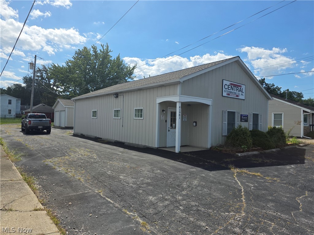 Great commercial location for your business! This property is zoned retail, with excellent visibility in a high-traffic area very convenient to Lorain and Elyria and a short distance from Amherst and Sheffield. Property comprises 1,720 square feet and contains a showroom, offices, a conference area, a kitchen, and two bathrooms, with a shower in one of them. Central air conditioning for your comfort. There's a two-car garage as well, with remote opener. Plenty of parking. Formerly an exterminating company, this location would work well for so many uses: pet grooming, a martial arts studio, retail sales like a flower shop for example, or even professional offices. The possibilities are endless- establish your business in this convenient, modern building. Currently on one-year lease expiring May 31, 2027.