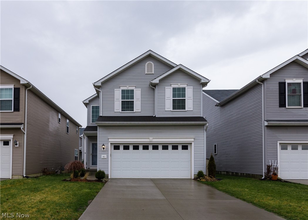 This beautiful 3 bedroom, 3 bathroom home in Northpointe Estates is only 8 years young! The main floor has 9 foot ceilings, brand new wood laminate flooring and has a completely wide open concept living room, dining room, and kitchen. The kitchen has a breakfast bar, 42" cabinets and stainless steel appliances. Also on the main floor is a half bathroom and a patio door that leads you out to your low maintenance, fenced-in backyard that is all set up for your gardening needs. Upstairs you'll find a large master bedroom with 3 closets and a spacious master bathroom with double sinks. There are two more bedrooms, a full bathroom, and a convenient second floor laundry room that rounds off the upstairs. You will not be disappointed with the basement family room and bar! There is plenty of room for a media space, man cave, or play room. You can walk to the community clubhouse and pool from your home and you are minutes from I90 and the Turnpike.