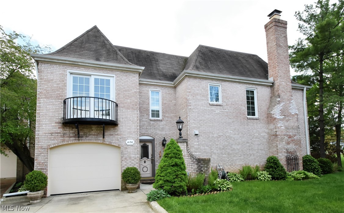 Spacious 2-story brick townhouse. Gorgeous Kitchen with granite, a master suite, 2nd floor laundry, spacious bedrooms, a private patio, full basement with an office & an entertainment room, and lots of storage. One year home warranty provided.