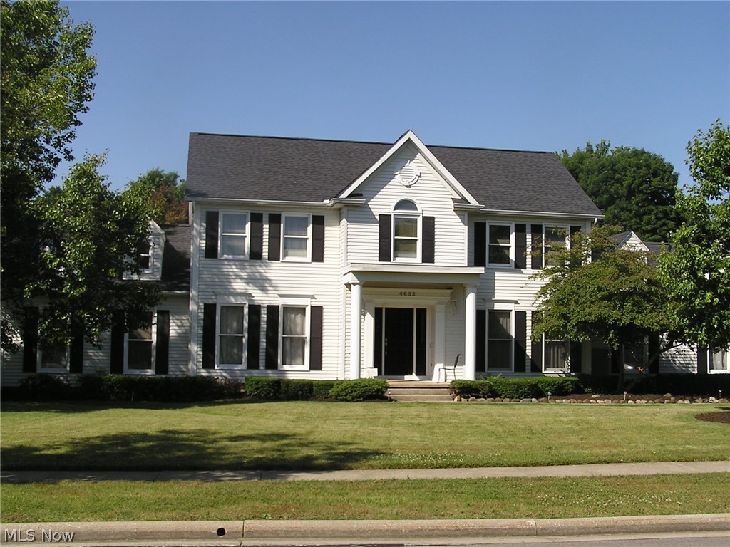 4 Bedroom center hall colonial in beautiful Eastwicke Farms.  Great room w/fireplace and vaulted ceilings plus separate living room.  Huge eat-in appliance kitchen, lots of cabinets and counter space w/access to party size deck and gazebo.  Back yard overlooks Metro Parks Bike & Hike Trail.  Master bedroom features jetted tub, shower and spacious walk-in closet.  Large foyer w/wood floors.  1st floor laundry.  Rec room and extra large office in lower level.  Roof re-shingled in 2015.  Priced to sell!