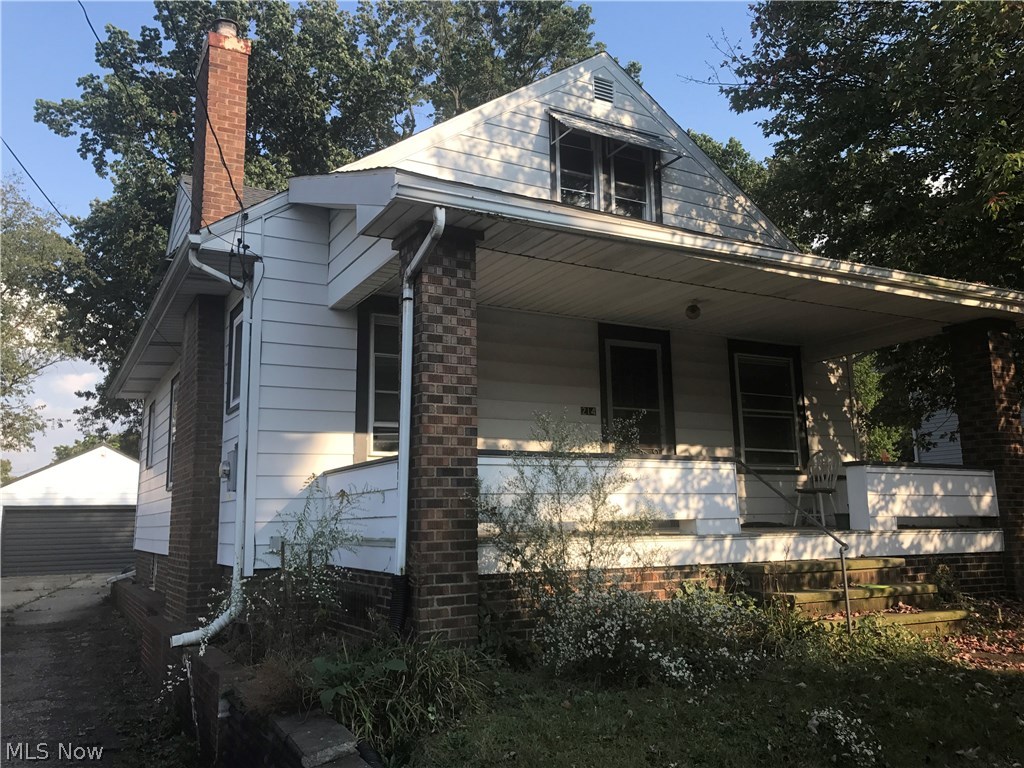 PERRY BUNGALOW located on a quiet dead end street!   Fenced rear yard with storage shed and fire pit ring.  Hardwood floor on the first floor.  Ready for immediate possession.