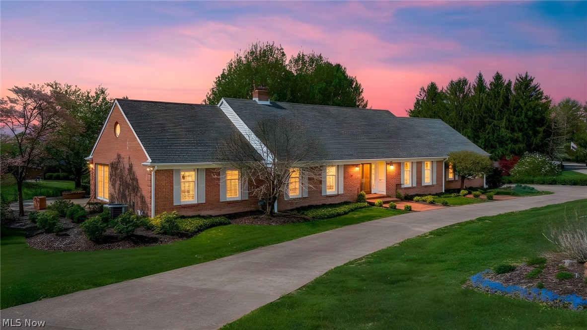 Custom-built brick Cape Cod set on a beautifully landscaped lot with a circular drive and an inviting brick patio terrace—perfect for outdoor entertaining and quiet evenings alike. This one-and-a-half-story residence blends timeless design with thoughtful craftsmanship, offered for the first time.
Step into an impressive open foyer highlighted by a sweeping circular staircase, setting the tone for the home’s character and elegance. The spacious first-floor master suite provides a private retreat, complete with a sitting area ideal for relaxation.
The classic kitchen is fully appliance and showcases a distinctive tile floor and handcrafted tile backsplash, offering both charm and functionality. A first-floor laundry room adds everyday convenience, while the formal dining room is well-suited for hosting gatherings.
Both the formal living room and family room feature fireplaces, creating warm, inviting spaces to unwind. Expansive windows throughout the home capture natural light and offer picturesque views of the surrounding landscape.
The home includes three bedrooms, three full baths, and two half baths, along with an additional finished living area in the basement—perfect for recreation, media, or extended living needs.
A 28' x 28' workshop provides exceptional space for hobbies or storage, complemented by an attached two-car garage. Rich wood flooring runs throughout much of the home, enhancing its warmth and timeless appeal.
A rare opportunity to own a thoughtfully designed, custom home in a beautiful setting—truly a must-see.