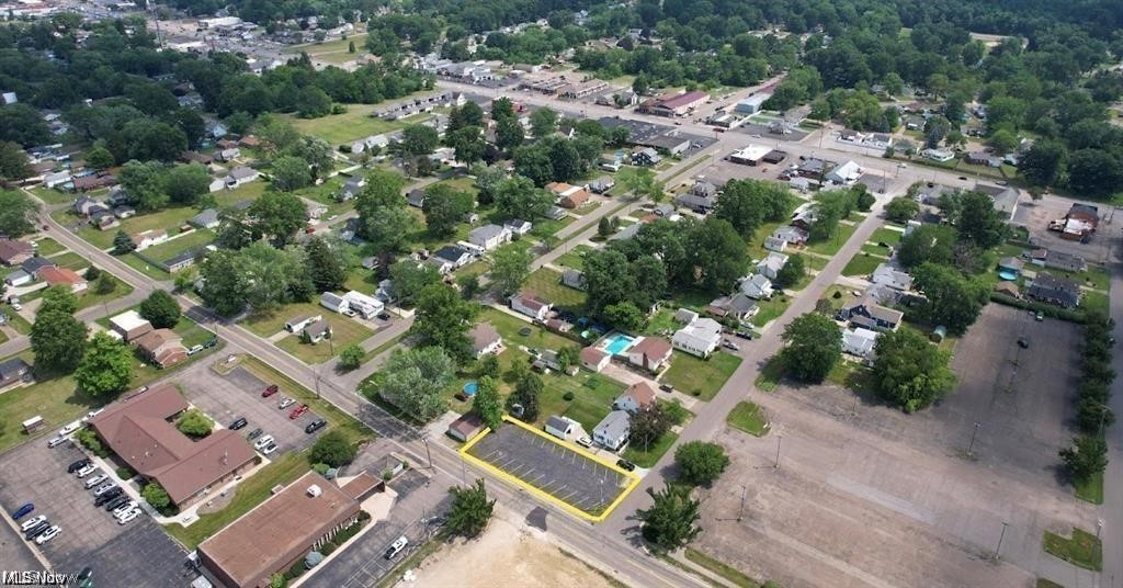 .0179 acre lot on the corner. Great for a parking lot or building lot. Lots of potential. Zoned R-3 60'x129'. Previously used as an extra parking lot. Looking for an affordable lot near the busy streets of Massillon? Look no further.