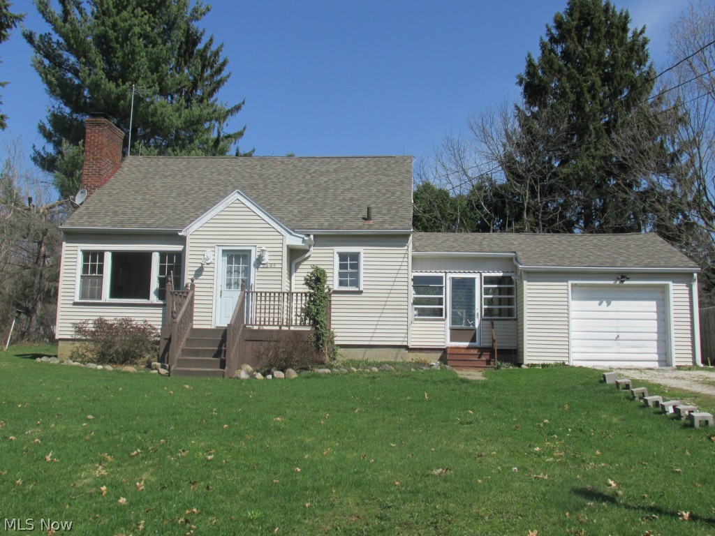 Seller offering $2000 toward new stove and refrigerator. Move-in ready vinyl sided 3 bedroom, 1.5 bath home on level landscaped lot makes living convenient with the attached garage.    Fresh and clean with newer furnace, central air, hot water tank, electrical box, water softener to name a few.   Upstairs bedroom has own half bath.  Great storage throughout!   Covered breezeway makes bringing groceries in very comfortable year round.   Recreation room, workshop in basement offer many options.   Glass block windows.   Backyard deck for summer parties, watching the perennials bloom or simply feeding the birds.  Affordable homeownership!  Call today!