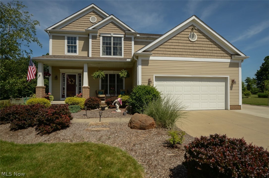 WELCOME HOME to 4824 King Meadow Trl, Kent, OH 44240 this Gorgeous custom built home on just under an acre in a wonderful King Ridge Development just North East of the I-76 and St Rt 43 junction! Very private dead end street, additional parking pad professionally landscaped waiting for you to make your home! 4 bedrooms, one is currently being used as Home Office with Freedom Rail system for great organizing! 2.5 bathrooms with additional roughed in basement bathroom ready to finish, first floor laundry room to accommodate your busy lifestyle. Great Room has a Direct Vent fireplace, raised hearth flanked by plenty of living space, open to expansive kitchen with great layout, wrap around center island with seating for 6 people as well as a morning room overlooking the wonderful backyard, deck, herb gardens, vegetable garden, firepit, garden shed & back woods! This great kitchen & living space layout allows for entertaining, serving & visiting all at the same time with open concept living