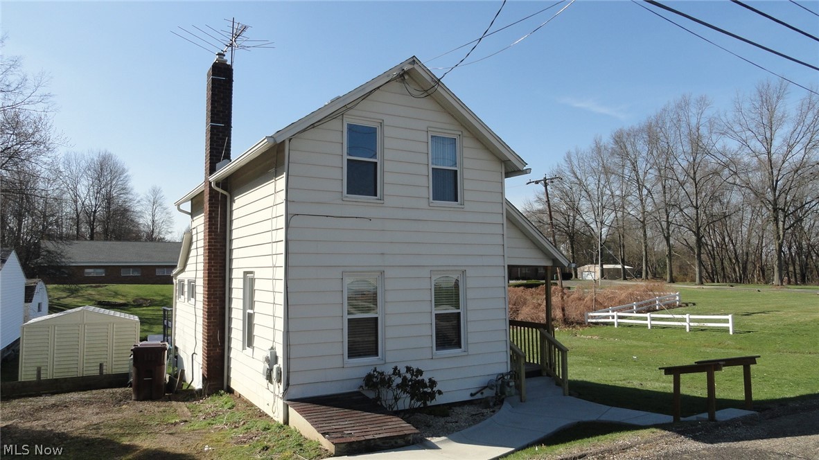 Move in ready, well maintained, cozy home situated on a sunny .35 acre lot with your own creek running through it.  Many updates include newer concrete walk, updated front porch, newer exterior doors, vinyl replacement windows, newer septic system, updated electrical, newer laminate flooring and carpet, updated kitchen and bath, and newer hot water heater.