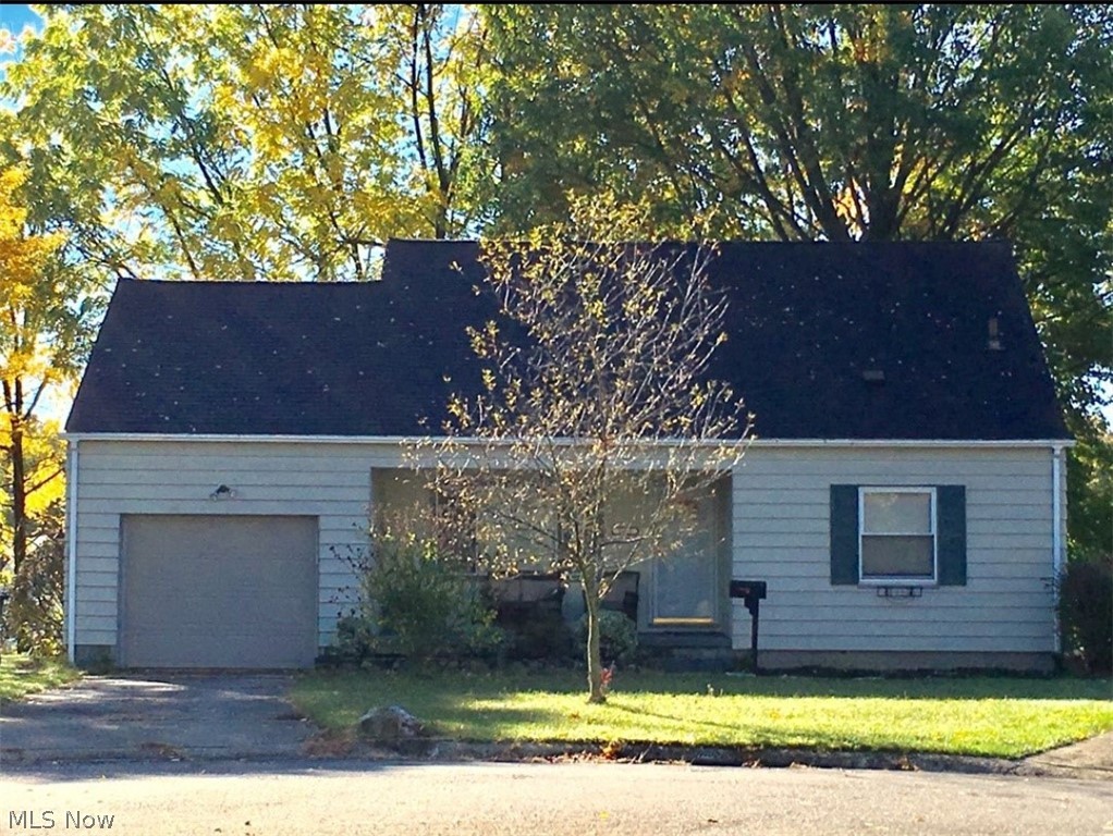 Terrific location! Tucked away on a quiet cul-de-sac. About a 10 minute walk to popular Portage Crossing. Hardwood floors in living room and under carpets in bedrooms. Wonderful 18 x 14 second floor private bedroom with custom built in storage and a half bath! Total living area includes awesome finished recreation room with an electric fireplace that remains with the home. Bar/Game area could also be converted into an in-home office or 4th bedroom. Perfect for entertaining! Modern kitchen with unique, efficient European style cabinets. Stove, refrigerator, microwave, dishwasher are all included! Patio door walks out right from your eat  in kitchen to your brand new, huge, low maintenance, composite deck! Home warranty provided by owner! Spend your holidays here this year!!!