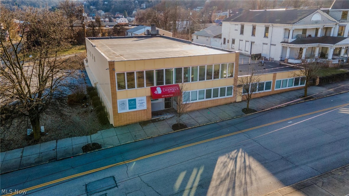 Be a part of the resurgence of Downtown Steubenville!!!  
Rare Value Add Commercial Office Space Opportunity in downtown Steubenville a block away from the Revitalized Commissioners Tower that is fully occupied.
This building offers over 12,000 sq ft of office space on two floors with private parking. This building is home of the Chamber of Commerce as well as 3 other tenants and room for more!  The main floor is vacant only due to the owner retiring and moving the business out after 20 years in business.  This is a great opportunity for an investor to buy a value-add investment building with a potential of a 10% CAP RATE or an owner occupied situation.  Please call the listing agent for a P&L and Projected annual cash flow proformas.  Come take a tour today!
