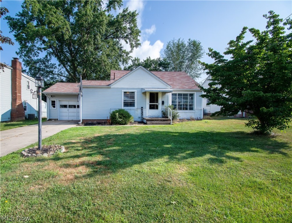 This charming bungalow in Plain LSD offers 2000 sq. ft. of bright living space.  Welcomed by the great room that features arched doorways, a built-in linen closet, and an abundance of natural light. The spacious dining room has newly installed laminate floors and cabinets galore. The charming kitchen has access to the covered breezeway which leads to the attached garage. The oversized master bedroom offers access to the deck and fenced-in backyard perfect for enjoying warm summer nights. A bright 2nd bedroom and a full bath featuring a walk-in shower complete the first floor. Upstairs offers a 3rd bedroom with multiple built-in dressers for ample storage. The full-sized basement features a finished recreation room with a convenient half bath. Make an appointment for your private showing today!