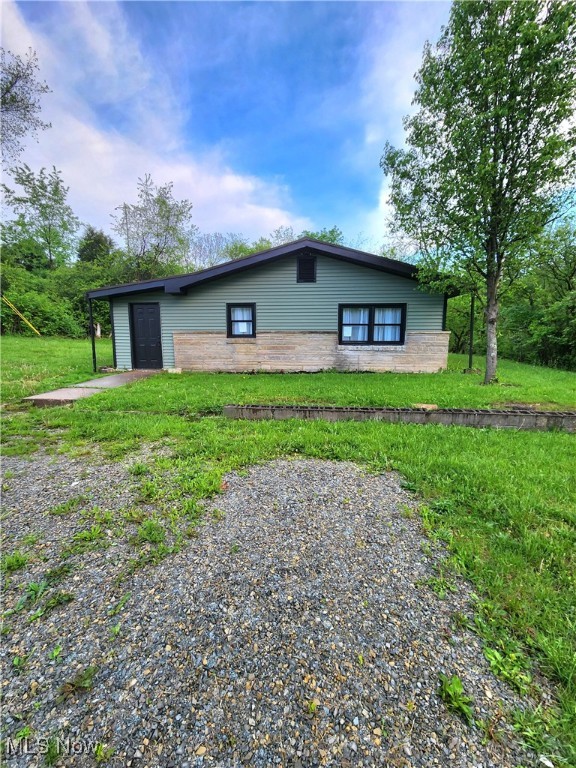 This Cute 3BR, 1 Bath Ranch home features a private location on 0.62 acres & is conveniently located just off of I-77. Enclosed Entry Breezeway. Open Concept Living Rm & Kitchen. Updated Kitchen features new appliances, backsplash, & Butcher Block Island. 3 spacious BR's with large closets. Newer metal roof, Furnace, Water Heater, Paint, Flooring & More! Call today for your showing!