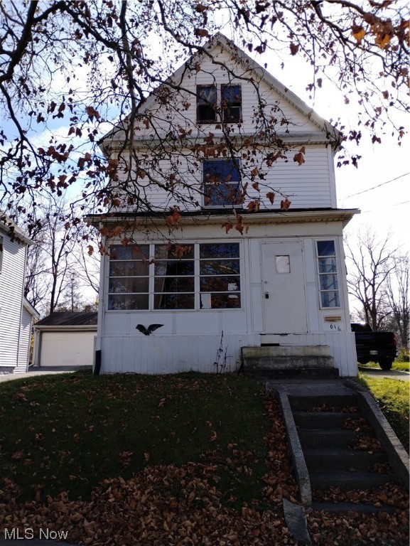 So much larger inside than it looks! Unique added architecture. Large kitchen with lots of cabinetry, large pantry off kitchen, built in dishwasher, stainless steel double sinks. Enclosed front porch. Huge 4 car Garage. New Roof 2019. Aluminum sided. Updated electric and PVC plumbing. Currently vacant. Average rent in the area is $875 and continuing to climb. Will make a great home for owner occupant or investor.