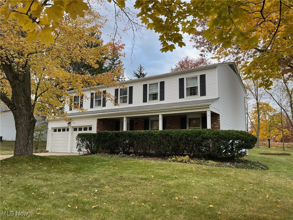 This spacious Colonial offers 6 bedrooms and 3.5 baths, with beautiful hardwood floors throughout. The large primary suite features an en suite bath and double closets for ample storage. A seventh room provides flexible space—perfect for a home office,  The formal dining room opens to a well-equipped kitchen with appliances included, plus a cozy breakfast bar area that flows into the family room. The convenient entry from the garage is steps away. Enjoy evenings by the wood-burning fireplace, or step outside to the patio and private backyard that backs up to a wide open field, ideal for relaxation or play. The full basement includes a large workshop with a built-in workbench, abundant storage, and waterproofing for peace of mind. Additional highlights include a two-car attached garage with an electric door opener, washer and dryer, and newer furnace, central air, and hot water tank. This home combines comfort, functionality, and charm—perfect for a growing family or anyone looking for space to spread out and enjoy. In close proximity to a neighborhood park. Immediate possession available.