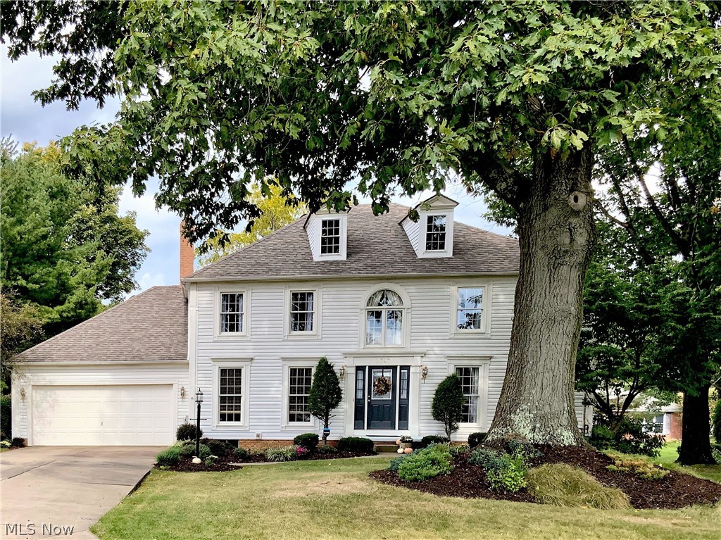 Beautiful Colonial with 4 bedrooms and 2.5 baths located on a Cul-de-sac in desirable St. Ives. As you enter the home, you are welcomed into the spacious foyer situated between the home office and the formal living room. Floor to ceiling windows and built in bookshelves enhance the 1st floor office. Hardwood floors and crown molding throughout foyer, living room and dining room. Enjoy preparing meals in the updated eat-in kitchen with granite countertops, subway tile backsplash, breakfast bar, open kitchen shelving, upgraded appliances, gorgeous lighting, and HORUS kitchen faucet. Kitchen appliances convey - GE Profile Refrigerator, Range w/convection oven, microwave w/convection oven and Bosch dishwasher. 1st floor family room with brick woodburning fireplace and oak mantel has French doors leading to deck and backyard. So much space, this home is perfect for those who love to entertain. Completing the 1st floor are, laundry w/utility sink, cabinets w/granite countertop and ½ bath. Up
