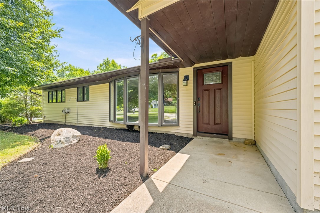 Welcome to this beautifully updated 3-bedroom, 2-bath ranch in the heart of Broadview Heights! This move-in ready home offers the convenience of one-floor living with stylish updates throughout.

The remodeled kitchen is the centerpiece of the home, featuring stunning stone waterfall countertops, stainless steel appliances, a wine fridge, and plenty of cabinet and prep space for cooking and entertaining. The inviting living room is highlighted by a cozy fireplace, while the versatile bonus room provides endless possibilities as a family room, home office, playroom, fitness space, or hobby room.

The spacious primary suite offers a walk-in closet and a private en-suite bathroom with accessibility features complete with a double-sink vanity. Two additional bedrooms and a second full bath provide comfortable accommodations for family or guests.

Step outside to enjoy the wooden deck overlooking the backyard perfect for relaxing or hosting summer gatherings. Additional highlights include a 2-car attached garage, a new hot water tank, and all kitchen appliances staying with the home. For added peace of mind, the seller is including an **America's Preferred Home Warranty (APHW)** for the new owner.

Conveniently located near shopping, dining, parks, and major highways, this beautifully maintained Broadview Heights ranch is ready for its next owner. Schedule your private showing today!