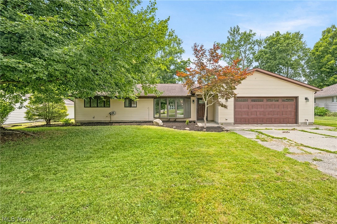Welcome to this beautifully updated 3-bedroom, 2-bath ranch in the heart of Broadview Heights! This move-in ready home offers the convenience of one-floor living with stylish updates throughout.

The remodeled kitchen is the centerpiece of the home, featuring stunning stone waterfall countertops, stainless steel appliances, a wine fridge, and plenty of cabinet and prep space for cooking and entertaining. The inviting living room is highlighted by a cozy fireplace, while the versatile bonus room provides endless possibilities as a family room, home office, playroom, fitness space, or hobby room.

The spacious primary suite offers a walk-in closet and a private en-suite bathroom complete with a double-sink vanity. Two additional bedrooms and a second full bath provide comfortable accommodations for family or guests.

Step outside to enjoy the wooden deck overlooking the backyard perfect for relaxing or hosting summer gatherings. Additional highlights include a 2-car attached garage, a new hot water tank, and all kitchen appliances staying with the home. For added peace of mind, the seller is including an **America's Preferred Home Warranty (APHW)** for the new owner.

Conveniently located near shopping, dining, parks, and major highways, this beautifully maintained Broadview Heights ranch is ready for its next owner. Schedule your private showing today!