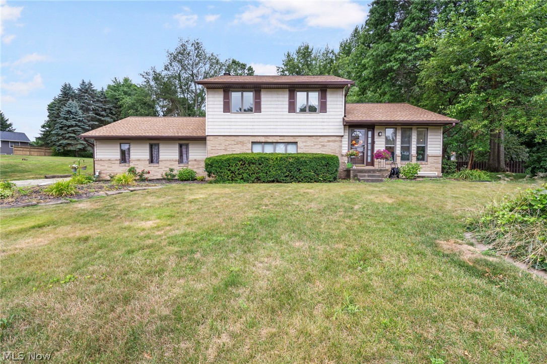 This spacious split-level home offers an inviting open floor plan on the main floor, featuring elegant granite countertops and a practical kitchen island. The family room is centered around a cozy fireplace, creating a warm atmosphere perfect for gatherings. French doors open to a delightful three-season room and deck, extending the living space outdoors for relaxation and entertaining.

Additionally the lower level features amenities such as a bonus room off the two car garage, an additional bedroom, a full bathroom, and an office, providing flexibility and extra space for various needs.

The upper level has the master bedroom that includes double closets for ample storage and a beautifully tiled shower in the ensuite bathroom. Two additional bedrooms share a second bathroom equipped with double sinks, providing convenience and comfort for the whole family.

Situated on a generous .6-acre cul-de-sac lot, the home ensures privacy and tranquility. A new roof installed just two years ago enhances both the home's aesthetic appeal and structural integrity, offering peace of mind to homeowners.

Overall, this home combines modern amenities with functional living spaces, making it an ideal choice for those seeking comfort and convenience in a quiet, well-maintained neighborhood. If you're interested in learning more or scheduling a tour, feel free to reach out for further information!