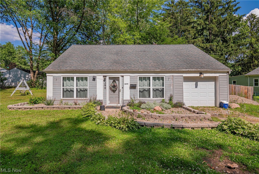 Welcome to 3679 Sanford Avenue! Sitting on a beautiful .4 acre corner lot, this cape cod boasts 3 bedrooms and 1.5 bathrooms. Enter into a large enclosed front porch where you will love drinking your morning coffee. Your kitchen comes complete with 2021 stainless steel appliances. Don't miss the conveniently located first floor laundry and first floor bedroom! The laundry/mud room sits right off the kitchen giving access to the back patio and fenced in backyard area.
You will find the two remaining bedrooms and half bath on the upper level along with plenty of closet space and built-ins. Enjoy your lovely treed side yard complete with a shed and bonfire area, perfect for entertaining! Washer/dryer 2019. Schedule your private viewing today!