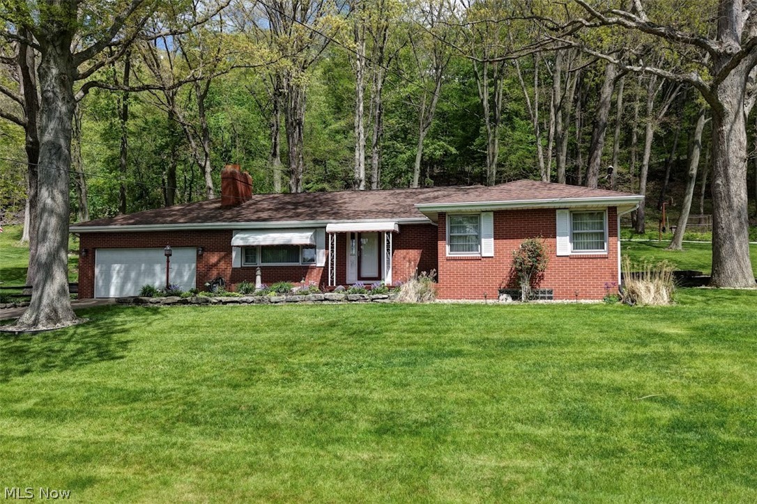 Charming 3-bedroom, 2 bath brick ranch home situated on 5.83 precisely maintained acres. It has the perfect blend of privacy space and country living. This property features a spacious layout with comfortable living areas, a functional kitchen and plenty of natural light throughout. This property provides the ideal setting with the convenience of ranch style living. Don't miss this rare opportunity to own acreage with comfort and versatility. Call today for your private showing.