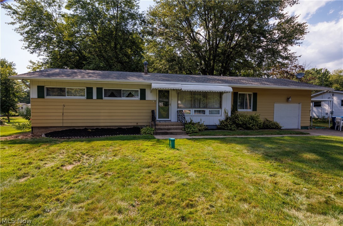 WOW! Do NOT miss your chance to see this Coventry ranch! Situated on over a 1/2 acre lot this home is coming in at over 1,300 square feet with spacious bedrooms and plenty of living space. As you enter the front door you are greeted by a large living room that opens up to one of the dining areas. Make your way to the fully applianced kitchen with plenty of counter and cupboard space where there is another large dining area. Around the corner you will find another large living room. Off the back of the house is a fully closed in porch with heat, perfect for anytime of the year! Complete with an attached garage, large yard, wooden  deck, and a shed for extra storage, this one is sure to please! Call today to schedule your private showing!
