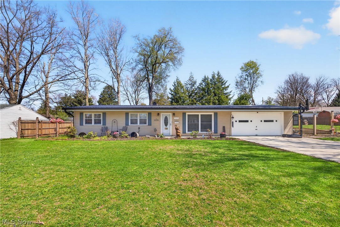 Welcome to easy one-floor living in the heart of Mentor! Ideally located within walking distance to restaurants and just minutes from the freeway, this beautifully updated three-bedroom ranch offers both convenience and comfort. Step inside to find fresh updates throughout, including a newly renovated kitchen featuring stylish cabinetry, granite countertops, and stainless steel appliances—perfect for everyday living and entertaining. Enjoy outdoor living in the fully fenced backyard with a spacious patio, ideal for gatherings or relaxing evenings. Major updates provide peace of mind: Roof (2020), furnace, A/C, and hot water tank (2018), microwave (2018), dishwasher (2021), washer and dryer (2023), refrigerator (2025), plus many windows replaced in 2018, Shed, Heated Garage. This move-in ready home is a must-see!