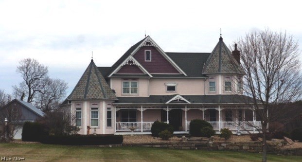 Country atmosphere dream home! Custom built Victorian Beauty resting on 26.5 acres! This spectacular home features a grand foyer entry, breathtaking great room with wood burning fireplace including 20 foot high ceiling, eye-appealing oversized kitchen with updated stainless steel appliances, granite counter tops, center island with access to the wraparound porch. First floor formal dining room and laundry room, abundance of custom hardwood floors and three ample sized second floor bedrooms with two full baths. First floor master bedroom features a one of a kind master bathroom including a Jacuzzi. Full basement has an additional fireplace, 80 gallon hot water tank, 12 coarse basement, and access to outside. Home has an attached triple car garage and a detached 6 car garage perfect for storage!