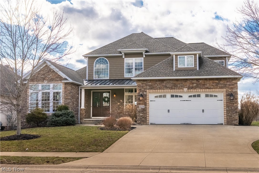 Pond-front perfection meets timeless custom design in this exceptional executive home located in The Sanctuary of North Canton. Stunning custom-designed executive home, perfectly positioned on a picturesque pond with breathtaking views and direct water access. Thoughtfully handcrafted and professionally appointed, this impressive 3,866 sq ft open two-story floor plan offers exceptional space for everyday living and effortless entertaining—both indoors and out.

This home features three luxurious Primary bedroom suites, each with spacious walk-in, finished closets and en-suite full baths. A fourth generously sized bedroom provides the ideal option for a private home office or guest space. 2 Primary Suites on the first floor and one Primary Suite on the second floor.

At the heart of the home is a chef’s dream kitchen, complete with a 6-burner gas cooktop, commercial hooded venting system, wall oven and microwave, double sink, expansive island seating five, and a large walk-in pantry. Custom, hand-finished cabinetry and granite countertops elevate both style and function.

The great room and morning room are filled with natural light and showcase full pond views, creating a serene backdrop year-round. Step outside to enjoy the covered patio accessible from the morning room and primary suite that is overlooking the water.

Additional highlights include 10-foot ceilings on the main level, 9-foot ceilings upstairs, in-ceiling speakers, dimmable LED recessed lighting throughout, pocket doors, a security system, dual HVAC systems with three zones, and a heated two-car garage—every detail thoughtfully designed for comfort and quality.

The Sanctuary community offers a swimming pool, clubhouse, and walking trails, providing a resort-like lifestyle in a peaceful setting.

This exceptional home is truly a retreat—find your peace here in The Sanctuary. Showings by appointment for well-qualified buyers.