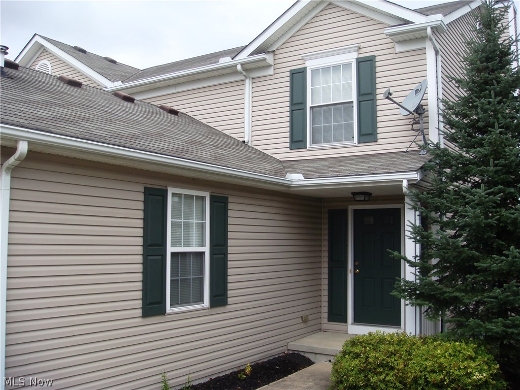 2-bed; 1.5-bath townhouse in Streetsboro! This gorgeous property boasts a spacious living room with stunning gas fireplace. Sliding glass doors bathe the living area in soothing natural light and provide easy access to a private wood deck.  Nice-sized kitchen has ample cupboard and counter space with lots of room to cook and entertain.  A large half bath; two coat closets; and convenient access to the one-car garage also located near the front entrance (yet discreetly away from the main living area).  The second floor has a large master bedroom with dual closets.  Just down the hall is the nice-sized second bedroom and a delightfully large and comfortable full bath.  The full basement has storage space galore and much potential to make this area your own. Clean and well maintained! All appliances stay! Just move right into this "roomy" and very liveable beauty!  Located approximately 5 mintues from local shopping; restaurants; and I-480/271 and the Turnpike.