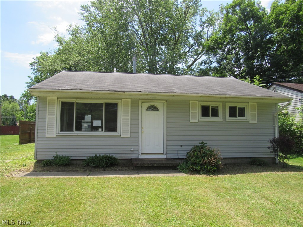 Adorable 2 bedroom ranch home in a desirable neighborhood with tree lined streets!  Bring your decorating ideas and make this your new home!  Eat in kitchen with ceramic tile.  Spacious living room with large picture window. Two neutral bedrooms and a remodeled bath complete this home!  Front bedroom is actually two tandem bedrooms.  Could be used as two bedrooms or a bedroom with office.  One car detached garage.  Priced to sell fast!  Stop by before it is gone!