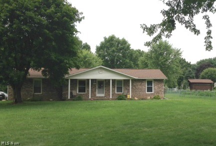 Beautiful corner lot just outside city limits! Near southside community park and south school. Kitchen has been completely redone into an open concept. This lovely ranch has 3-4 bedrooms and is move in ready!