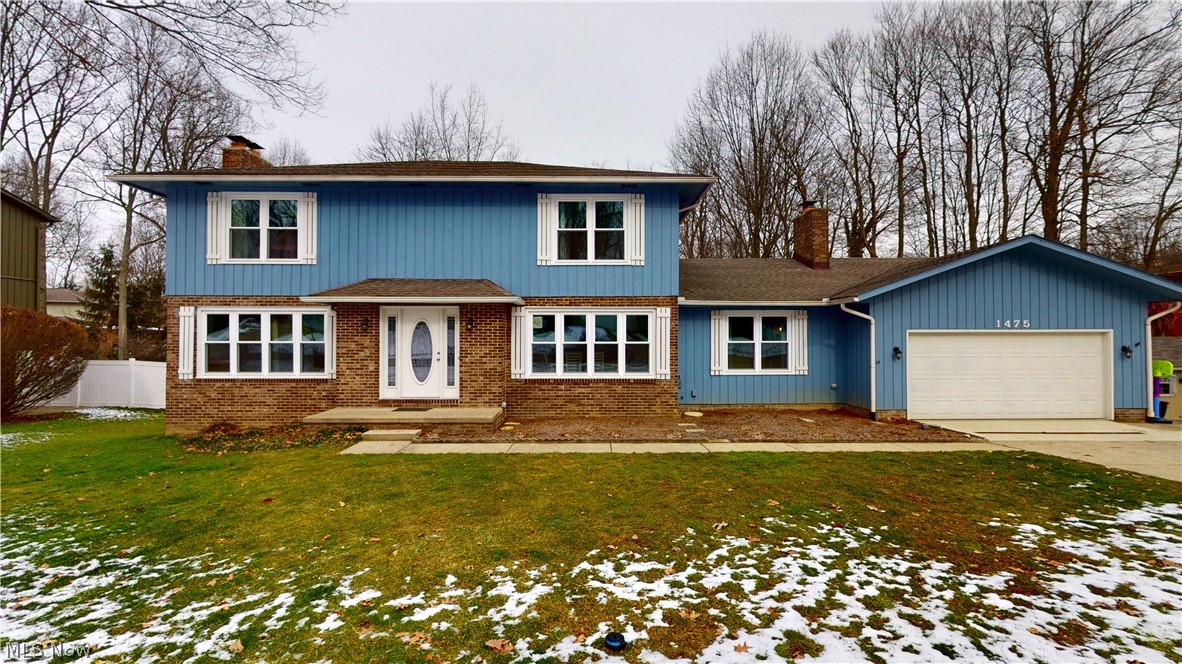 Welcome to this beautiful 4-bedroom 2.5-bathroom colonial in Stow! You will not be disappointed with the living space, offering over 2700 sq. feet! Enter the gracious foyer with a curved staircase up to the second floor. You can then walk straight into the kitchen or into the living room with a beautiful brick fireplace. Do not forget about the separate family room with vaulted ceilings, another secondary fireplace, and a sliding door leading to the spacious back porch.  Enjoy evenings overlooking the beautiful, wooded landscape in the backyard! Master bedroom is a great size with tons of closet space and a full master bath. There are 3 more generously sized bedrooms for your growing family. The unfinished walkout basement offers endless opportunities. Newly Paved garage floor and drain (2019), New Furnace & A/C (2018), New Hot Water Tank (2018), New windows (2019), All new toilets (2019). Do not miss out on this opportunity to call this home.