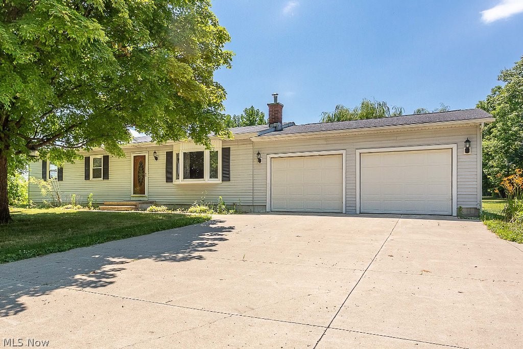 Very nice country ranch home on two acres in Huntington Township. This home features a large kitchen with all appliances staying including washer and dryer, large pantry and a ceramic tile floor. Hardwood floors in living room and bedrooms. The windows have been updated and the garage is insulated with a steel ceiling. There is a full basement with a wood burning stove and lots of room to finish extra living space. This home has been well cared for and ready to move in. Located in the Black River school district and can give immediate possession!
