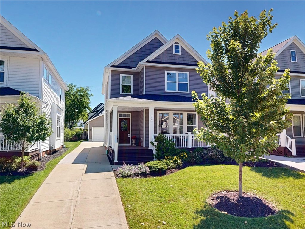 Welcome home to this beautifully crafted Knez-built residence in the highly sought-after Moreland neighborhood of Shaker Heights! Built in 2020, this exceptional home combines modern design, timeless finishes, and an unbeatable location just minutes from Downtown Cleveland. A charming front porch welcomes you into a bright, airy interior featuring soaring 10-foot ceilings, an open-concept layout, recessed lighting, elegant window treatments, and an abundance of natural light throughout. The stunning chef’s kitchen is the heart of the home, showcasing quartz countertops, stainless steel appliances, a spacious center island, pantry, and seamless flow into the living and dining areas—perfect for both everyday living and entertaining. The first floor also offers a convenient powder room and laundry room. Upstairs, retreat to the impressive owner’s suite featuring a dramatic peaked ceiling, spacious walk-in closet, and luxurious en-suite bath with dual vanities and a walk-in shower. Two additional generously sized bedrooms and a beautifully appointed full bath with stylish encaustic-style patterned flooring complete the second level. The expansive lower level boasts exceptionally high ceilings and endless possibilities—create the ultimate home gym, movie theater, game room, simulator space, home office, or recreation area. Ample storage and a dedicated mechanical room add to the home’s functionality. Enter outside to enjoy the attractive stone patio, ideal for relaxing, grilling, or entertaining guests. A detached two-car garage provides additional convenience. Perfectly situated near shopping, dining, UH Hospitals, Cleveland Clinic, and just a short distance to the Blue Line Rapid Transit, this move-in-ready home offers the perfect blend of style, comfort, and accessibility. A rare opportunity to own newer construction in one of Shaker Heights’ most desirable neighborhoods! 1-Year Home Warranty Included!
