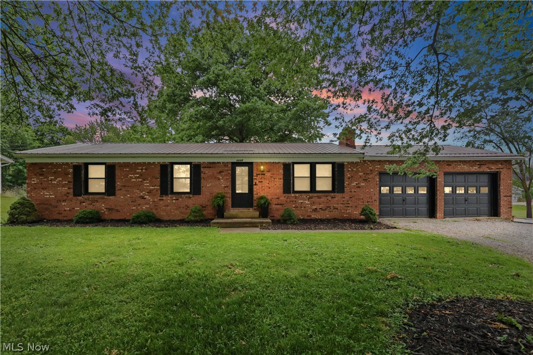 Completely renovated Craftsman-style ranch in the Village of Westfield Center. Move-in ready with extensive updates throughout. Exterior improvements include a metal roof and windows (2018) and new exterior doors (2023).

The open-concept main floor features luxury vinyl flooring, a natural gas fireplace with hickory mantel, built-in shelving and cabinetry, and Craftsman-style finishes throughout. The kitchen offers 42" cabinets, large island, pantry cabinet, counter-depth refrigerator, under-counter drawer microwave, electric range with hood, and abundant cabinet space.

Three bedrooms on the main level, including a primary suite with private full bath and built-in closet. Additional fully renovated hall bathroom. Solid-core doors and quality trim work throughout.

Finished basement provides additional living space with a large recreation area plus a separate room ideal for a home office, guest room, or potential 4th bedroom. Laundry located in the unfinished utility area.

Major mechanical updates include new electrical, high-efficiency tankless gas water heater, high-efficiency 2-stage gas furnace and central A/C, new insulation in walls and attic, LED lighting, and energy-efficient GE appliances. Optional gas washer and dryer available.

Conveniently located across from Westfield Center Village Park and just minutes from Westfield Country Club. Energy-efficient upgrades throughout help keep utility costs low. Move right in and enjoy.