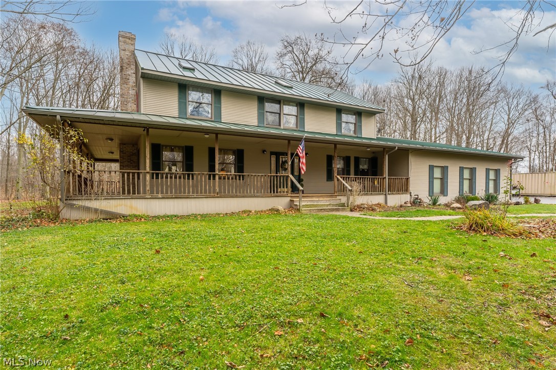 Looking for a Sanctuary on almost 3 Acres of Nature Surround, seemingly unknown and untracked... like you wanna Take the Trail or go Off The Grid kind of feel? Come and feel it in every aspect of this 5 Bedroom (one of which is a First Floor Suite w/Skylights), 4 Bath Spectacular Home!  The HUGE windows throughout are the Highlight of the interior of this house.  Employ the 3 Car garage with a provision for an RV or Boat.  Relax in Comfort and Privacy on your own Wrap-Around Porch which extends from Front to Back of house!  Can you imagine watching Fall Foliage, Snowflakes, Thunderstorms & Raindrops, and Forest Animals?  See Blossoming Trees & Flowers pushing through the earth right in front of you.  Gracious Seller is offering a Premium Home Warranty.  This might be your only chance...  Come & See it for yourself.  Call today!
