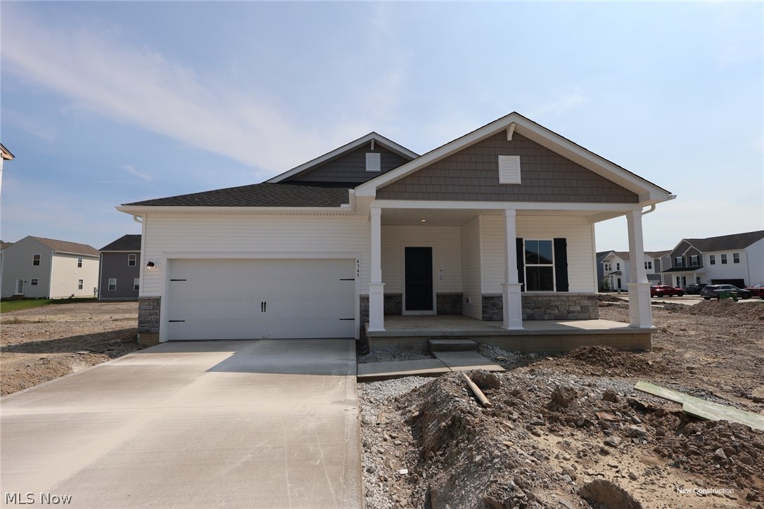 This highly desirable Daffodil ranch floorplan offers 3 bedrooms, 2 full baths, and 1,628 sq ft of thoughtfully designed living space. Featuring the popular Farmhouse Look interior design package with luxury vinyl plank flooring, quartz countertops, and a beautiful tile walk-in shower. The open-concept great room creates an ideal space for entertaining or everyday living.