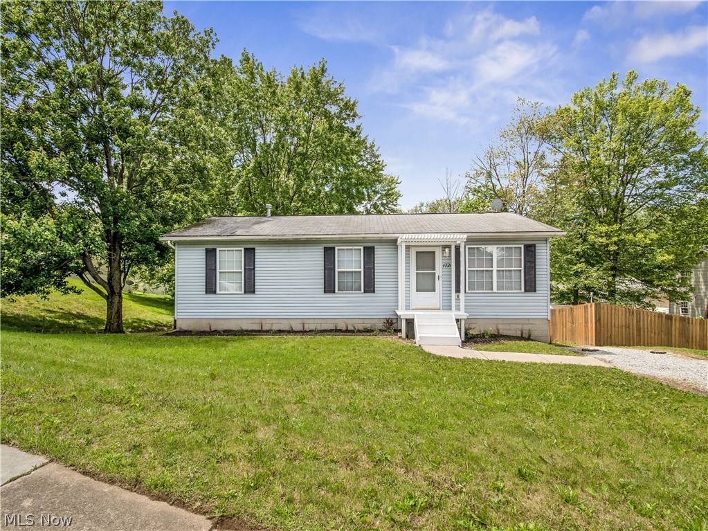 COMPLETELY remodeled ranch with finished walkout basement.  NEW HWT, furnace, A/C.  Ceiling fans in all rooms.  new doorbell, refrigerator, stove.  All new wood flooring.  Fresh paint throughout the entire home.  New disposal, new hardware on kitchen cabinets. New kitchen sink, faucets.  New bathroom faucets.  Basement just completely finished.  Fenced in backyard with tall wood privacy fence.  Shed in the back.    This is MOVE IN READY.