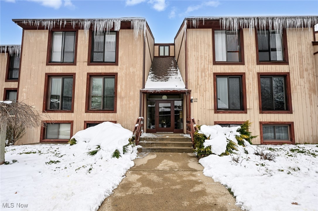 Sharp upper level 2 Bedroom, 2 Bath ranch condo in the Juniper Hills association of Greenwood Village. Much of this neighborhood borders the Cuyahoga Valley National Park. The Hike & Bike Trail is close by. Condo is professionally remodeled with updated Kitchen & 2 full Baths. Kitchen features custom maple cabinets, Corian counters, pantry, laminate flooring, & stainless appliances. In unit stacked washer & dryer as well as full-size W&D in common 1st floor utility room. Formal Dining area off Kitchen. Spacious carpeted Living Room with sliding glass door to private covered balcony (10x7) overlooking wooded area. Both Baths have great looking, oversize tile flooring, custom shower surrounds, newer cabinets, counters & plumbing fixtures. Detached 1-car Garage w/ opener. All interior closet doors are newer. The building is in the process of being vinyl sided. (No assessment) Greenwood Village offers spacious Clubhouse w/ meeting rooms, indoor & outdoor pools, fishing lake, tennis, playground and so much more. Pet friendly! A nature lovers paradise! Make sure to watch the virtual tour.