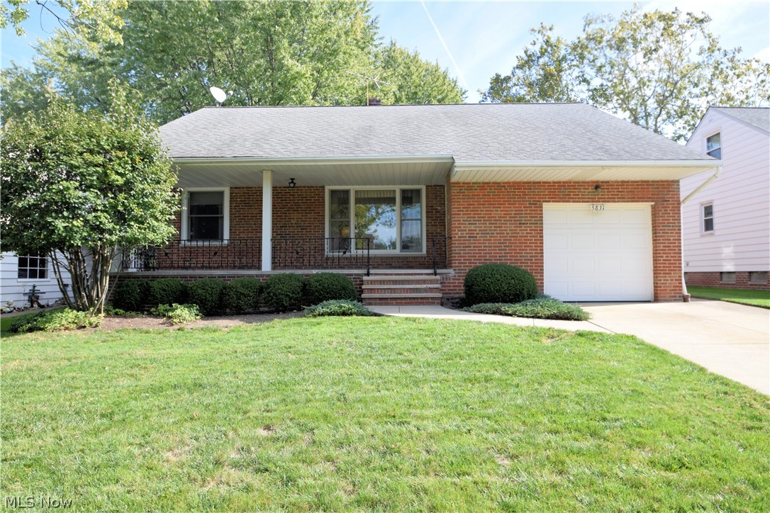 Spacious 4 bedroom and 2 full bath brick beauty with a large front porch! Located next to the metroparks! Gleaming hardwoods throughout! Large living room and dining room with french doors to backyard. Eat-In Kitchen includes appliances! 3 bedrooms and full bath complete the first floor. Huge master with full bath, cedar closet and bonus space with built-in shelving and storage perfect for office or craft space! Large rec room and laundry/utllity area. All new Anderson windows! Schedule your private tour today! Wouldn't this be a great place to call home!