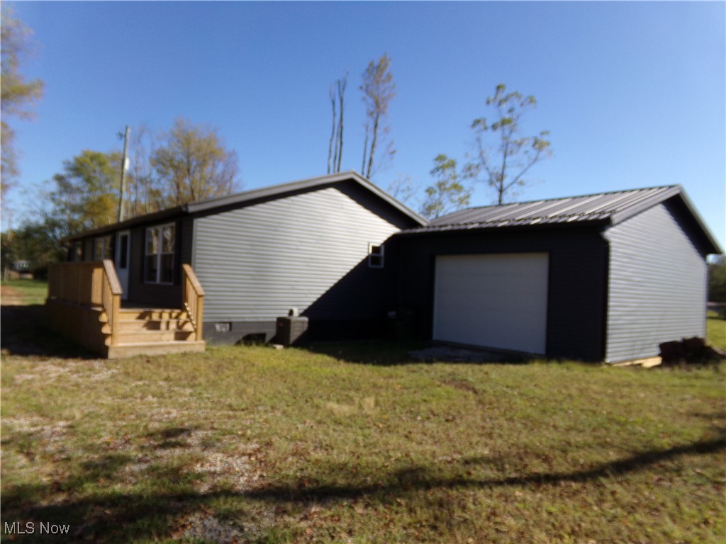 Acreage- Privacy all with a completely remodeled home. close to the interstate
NEW PROVIA windows, exterior doors, & siding. NEW matted steel roof from Stoney Point along with spouting to match.
2 New decks, NEW attached garage, NEW subflooring & laminate through the house. NEW interior doors, NEW kitchen cabinets & Island, All NEW appliances, NEW service panel, wiring, lighting, outlets, switches by Joe Dump Electrical. All NEW plumbing, NEW heating & cooling units, completely NEWLY painted & NEW trim, NEW smoke detectors, NEW Aerator in septic. CLICK on virtual tour icon to view land
