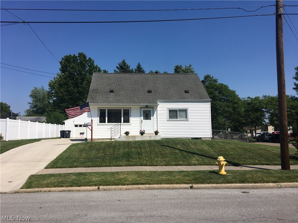 You must see this home!  So many updates, just pack-up your belongings and move right in.  This is a one owner home and is very well cared for and maintained.  The yard is beautiful and looks like a park (the picnic table and bird bath stay).  The newer (2015) driveway and spacious 2 1/2 car garage (with water and gas) give this home plenty of curb appeal.  You will appreciate the newer (2015) Trane furnace and a/c, (2004) roof, (2009) bath fitter bathroom remodel, (1998) new windows and siding, and (2007) water heater.  If all of those updates aren't enough the sellers will give you a 1 year home warranty to give you an additional peace of mind.  Don't delay to see this home today.
