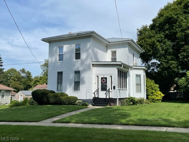 New on the market, after being lovingly cared for by the same family for decades! Charming 1875
farmhouse with newer metal roof, countertops and laminate flooring in the eat-in kitchen, bathroom
and laundry room.  Walk in thru the side door to a spacious mudroom/laundry room with huge closet and quaint storage
nooks. Perfect area for shoes and backpacks keeping the rest of the house neat and tidy. Bathroom is
conveniently located off the laundry room. It features the original claw foot tub, with shower ring, large
vanity and newer laminate flooring. The eat-in kitchen is open to the large living room, making for
functional entertaining or ease in supervising kids while you make dinner. Also on the main floor is a
bedroom and the original parlor used as a beautiful dining room flooded with natural light. For those
that want one-floor living, but don’t want to give up space, this layout would be perfect.
If you are looking to be in the city but still want ample outdoor space, th