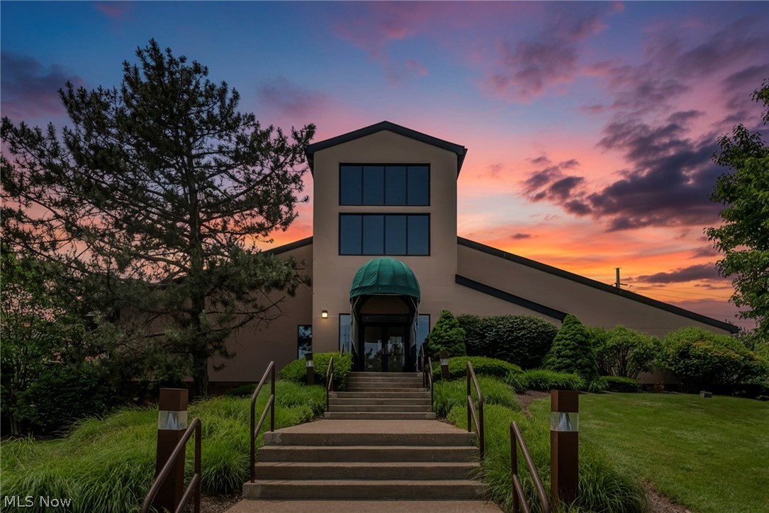 Welcome home to this beautifully updated end-unit condo in the sought after, guard-gated Woodhawk community of Mayfield Heights. With soaring ceilings, abundant natural light, and a private end-unit location, this 2 bedroom, 2 bath home offers an inviting, low-maintenance lifestyle in one of the area's most desirable communities. Recent updates include new Roof, newer laminate flooring, beautifully renovated bathrooms with walk-in showers, a stylish barn door, and a new hot water tank, making it truly move-in ready. The attached 2-car garage is a rareity. Woodhawk residents enjoy resort-style amenities, including two community pools, tennis courts, walking paths, and beautifully maintained grounds. Just minutes from Beachwood Place, Legacy Village, Pinecrest, and ETON Chagrin Boulevard, you'll have endless shopping, dining, and entertainment options nearby. Local favorites like M Italian, Yours Truly, and Kitchen Social are all within a short drive, along with convenient access to I-271, I-90, the Cleveland Clinic Hillcrest Hospital campus, and downtown Cleveland. Whether you're looking to simplify your lifestyle or enjoy maintenance-free living without sacrificing location or amenities, this home checks all the boxes.