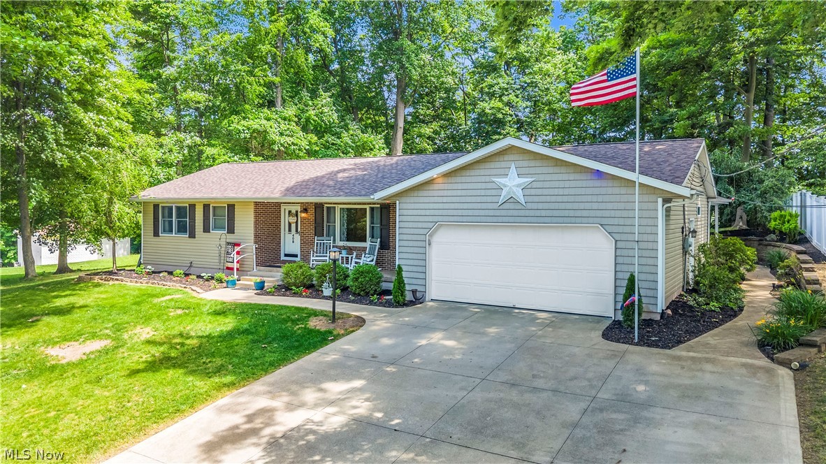 Welcome to this immaculately maintained ranch-style home situated on a private half-acre lot. Located within walking distance of downtown Canal Fulton, parks, and countless amenities, this move-in-ready property offers 3 bedrooms, 3 full bathrooms, and 2,244 square feet of meticulously cared-for living space – plus additional finished living space in the basement. Step inside to discover fresh neutral paint and beautiful flooring throughout. The kitchen features a breakfast bar, granite countertops, rich hardwood cabinetry, newer stainless steel appliances, and opens directly to a spacious dining area. Every bathroom in the home has been tastefully remodeled. Designed for comfortable living and entertaining, the expansive layout includes a large living room and an additional family room, where sliding glass doors lead to a charming covered patio with stamped concrete. The backyard is a private retreat, complete with a heated above-ground pool surrounded by a custom deck, – gas grill and storage shed stay with the home. The large finished basement offers a workshop, a laundry room with built-in cabinetry (washer and dryer included), a full bath, and a versatile bonus room ideal for an office, guest room, or potential fourth bedroom. An oversized garage and central air add to the convenience and comfort of the home. Major updates include a new roof (2026), a hot water tank (2024), a 150-amp electrical panel (2022), and a recently serviced HVAC system. Move right in and enjoy!